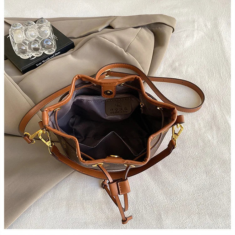 Sac de luxe élégant avec cordon de serrage et bandoulière